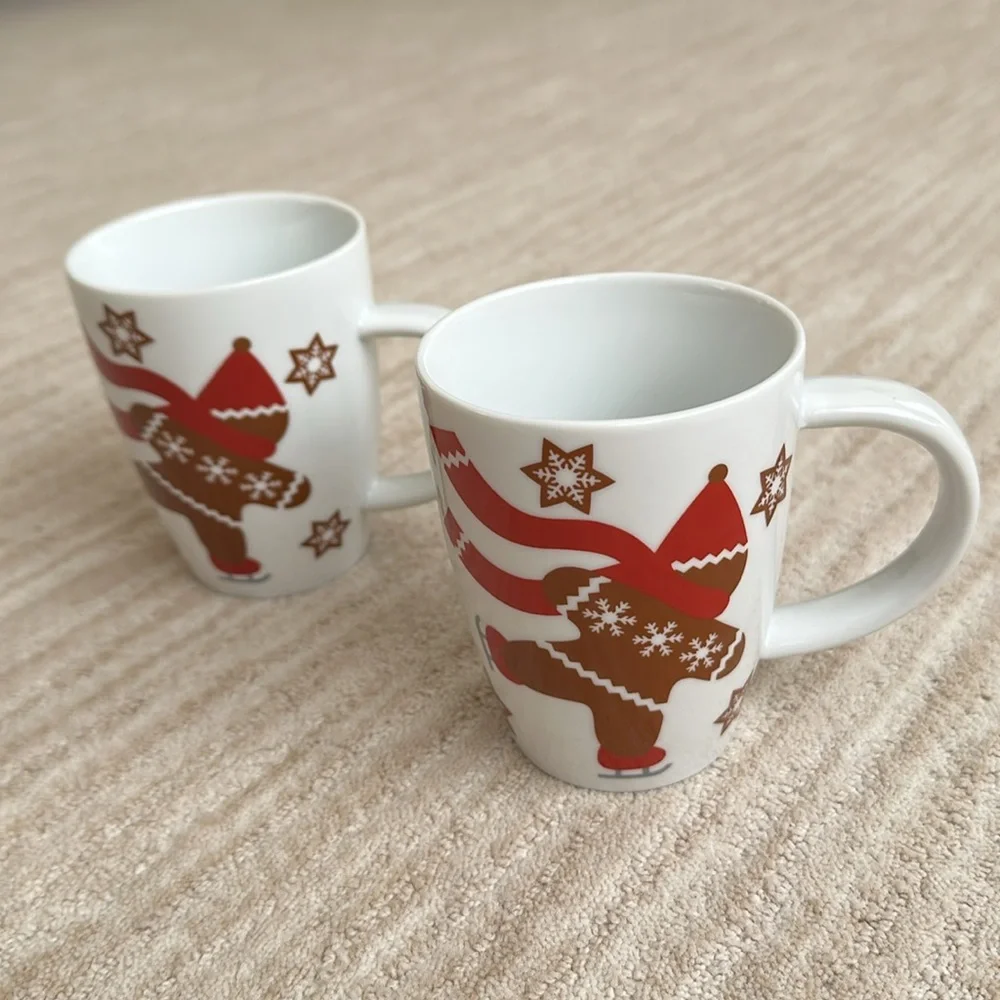 Set of 2 Crate & Barrel GINGERBREAD MAN Skating Snowflakes Coffee Cup Mug 4 1/2
